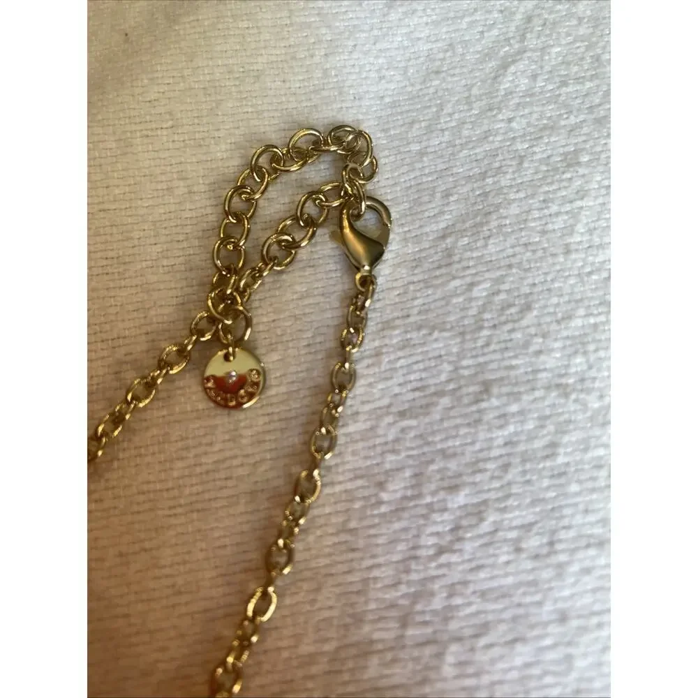 Long Gold Tone Necklace Featuring Yellow Flowers NWOT